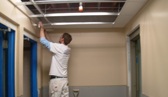 Photo installing a drop ceiling